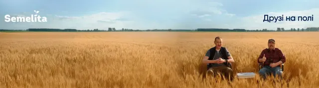 Two men in a wheat field, advertisement for Campanino wheat variety