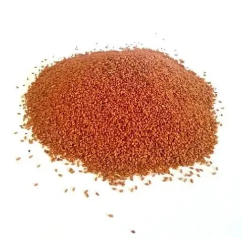 Seeds of Camelina sativa 'Uzen' variety in a pile