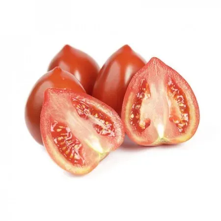 Fresh tomatoes, one cut in half, on a white background - AMOURIN